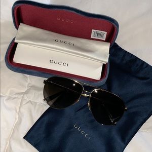 Gucci Sunglasses.